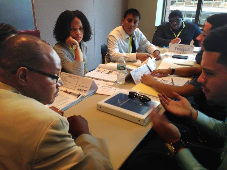 People at a roundtable meeting