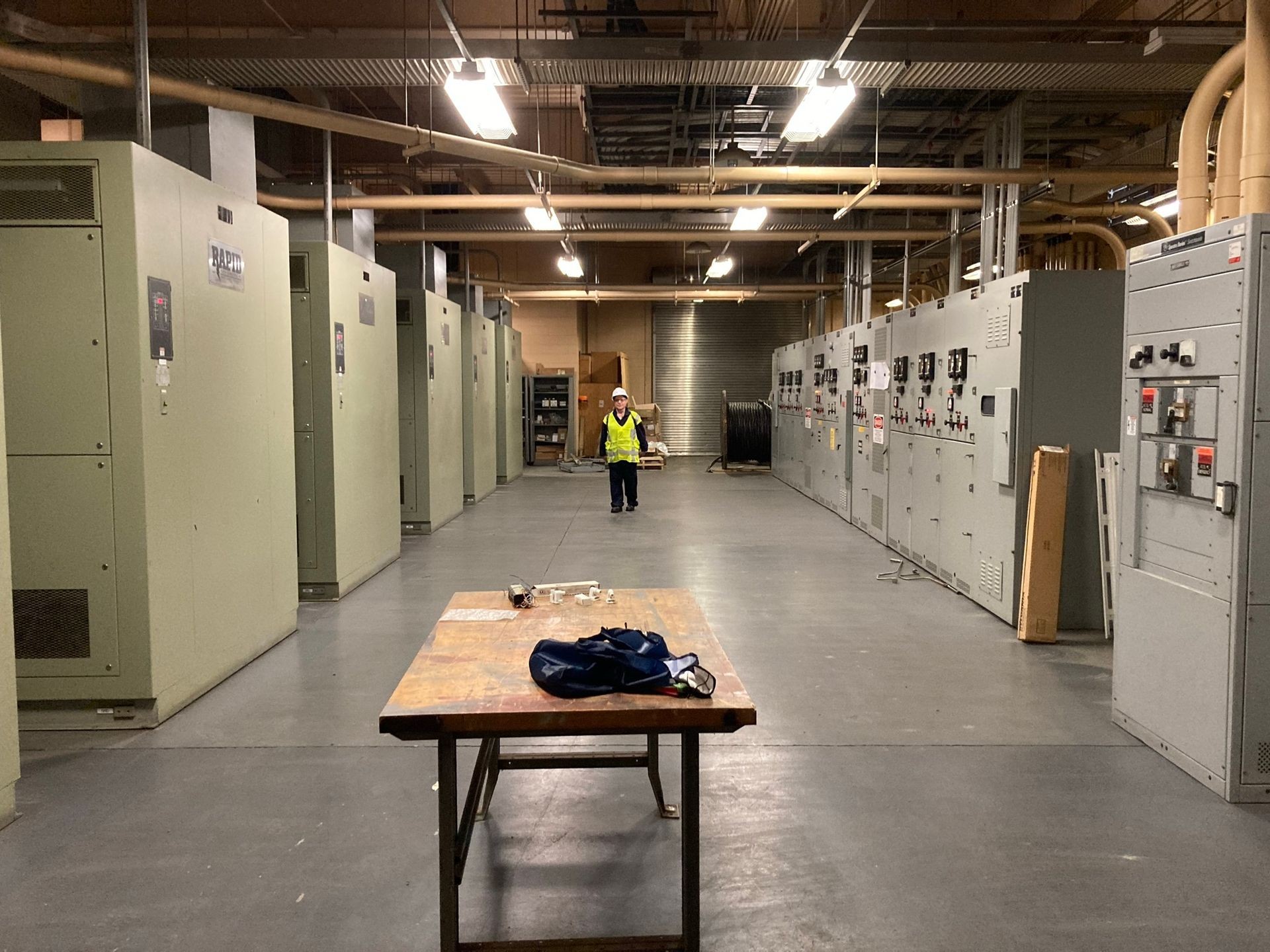 Worker inside a traction power substation