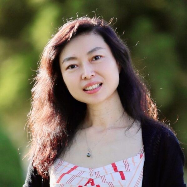 Headshot of Deputy Director Xinge Wang